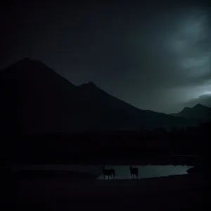 Vibrant Horizon: Majestic Mountain Range at Dusk