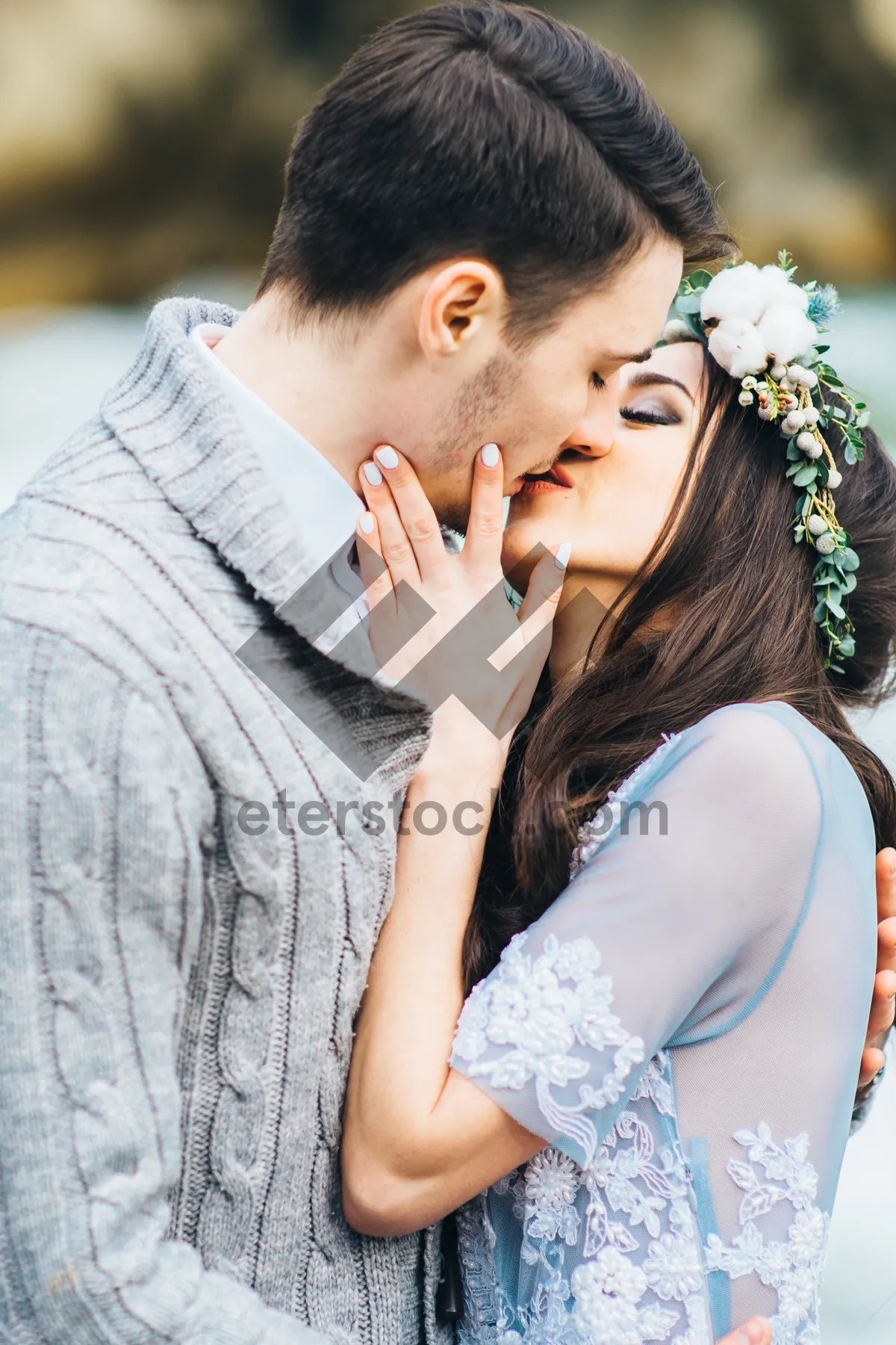 Picture of Happy couple smiling and calling on phone together