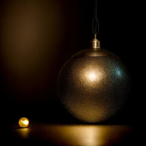Festive Gold Bauble Hanging from Tree