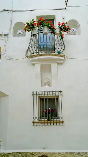 Architectural Balcony with Chandelier and Menorah