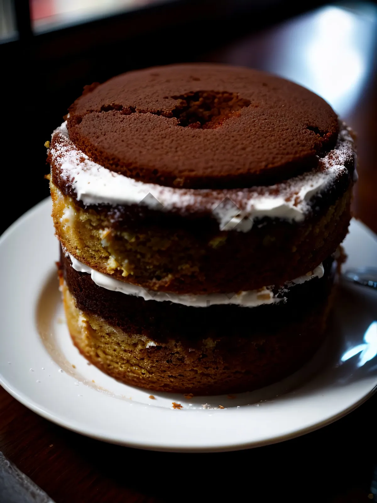 Picture of Delicious Morning Indulgence: Chocolate Cream Cake and Cappuccino