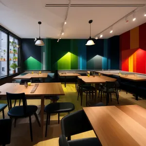 Modern restaurant interior with stylish furniture and lighting.