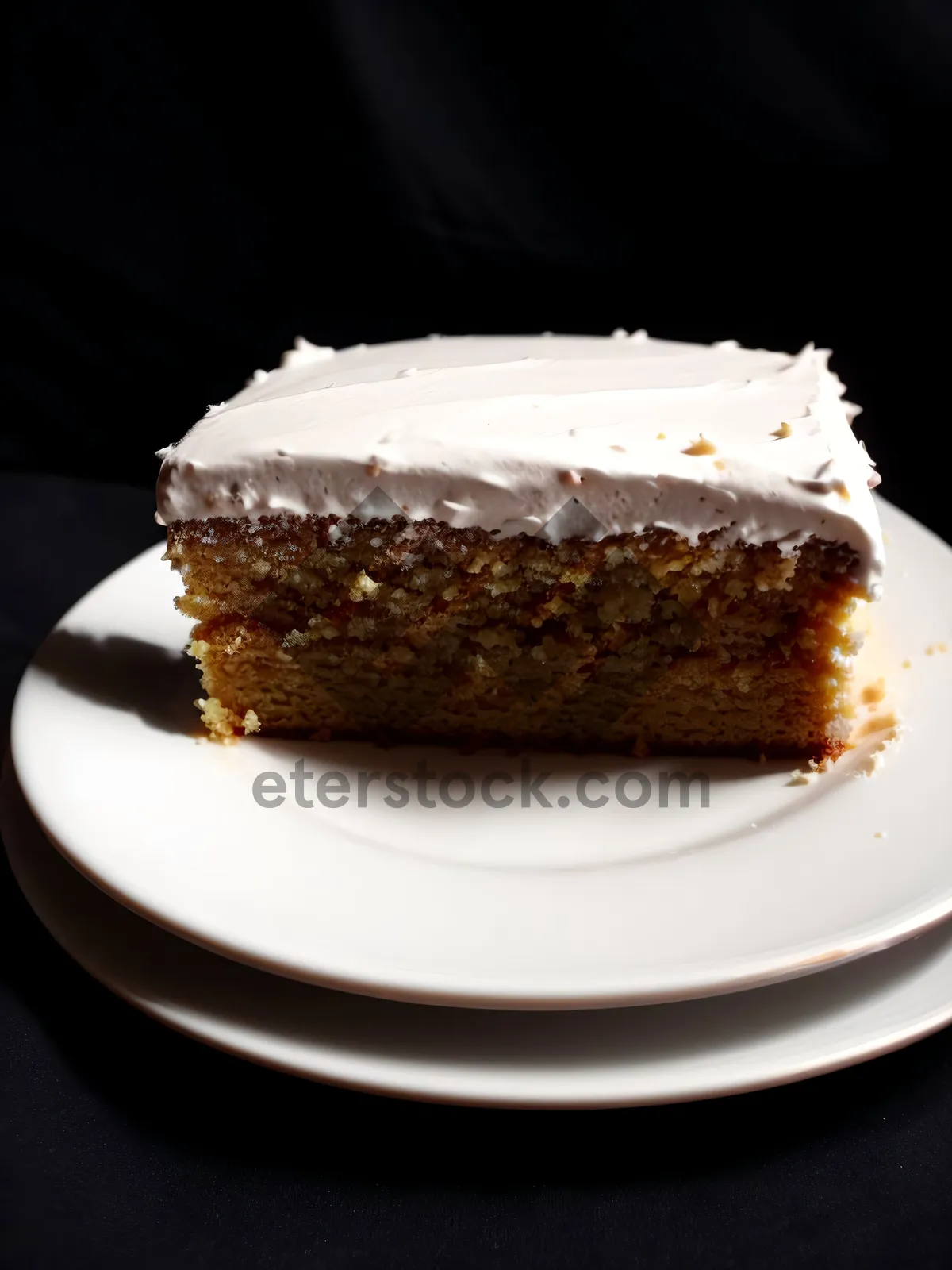 Picture of Sweet chocolate cake with creamy coconut topping.