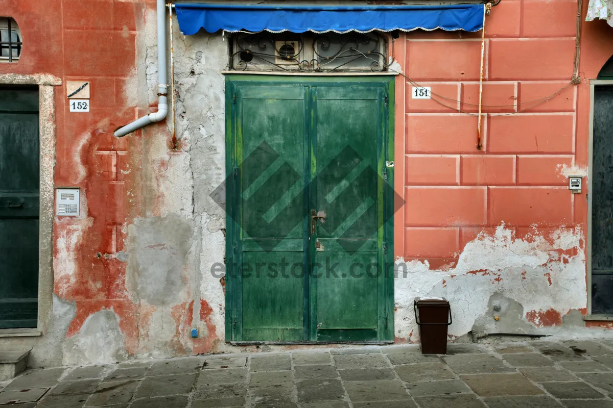 Picture of Ancient Wooden House with Stone Entrance and Vintage Brick