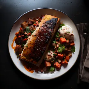 Delicious grilled steak with spicy tomato salad.