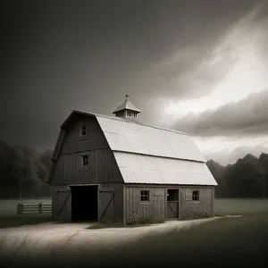 Rustic Snowy Barn Against Serene Cloudscape