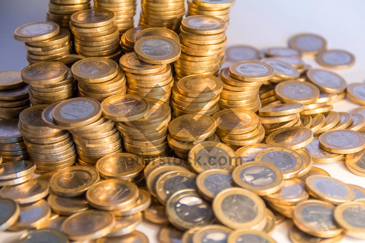 Picture of Golden coins stack in closeup business finance concept