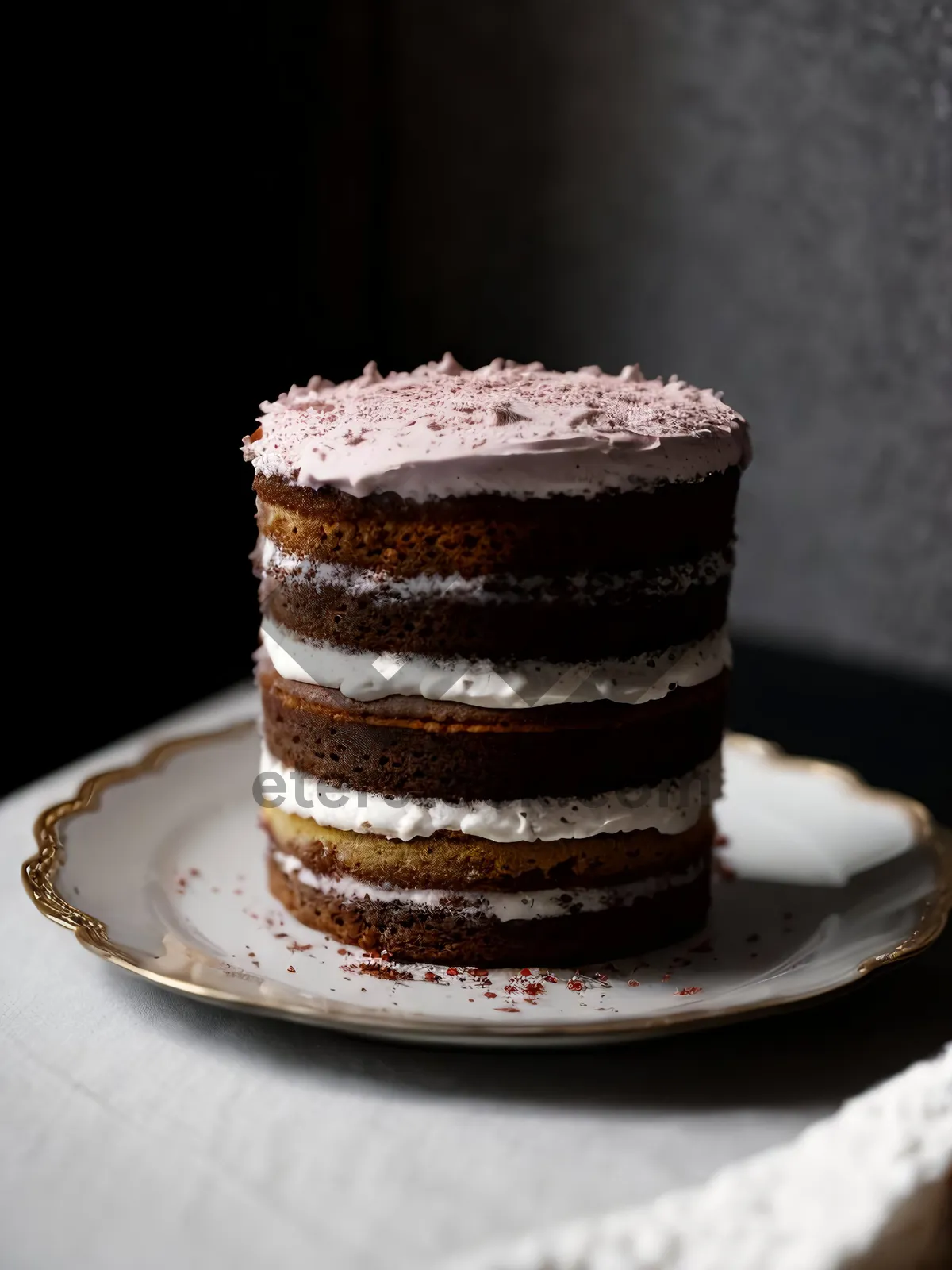 Picture of Chocolate cake with fruit garnish and whipped cream