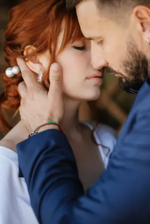 Happy couple smiling in a romantic relationship portrait.