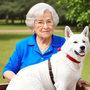 Darling Dog Smiles in Park with Loving Family