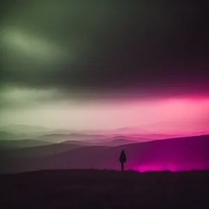 Vibrant Sunset over Rural Meadow