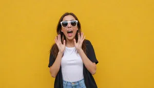 Fashion model with sunglasses posing in studio portrait.