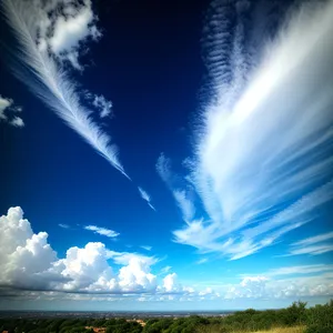 Vibrant Summer Skies: Sunlight Illuminating Clouds