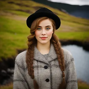 Smiling brunette lady in casual cardigan sweater outdoors