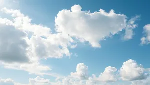 Bright Summer Sky Landscape with Fluffy Clouds.