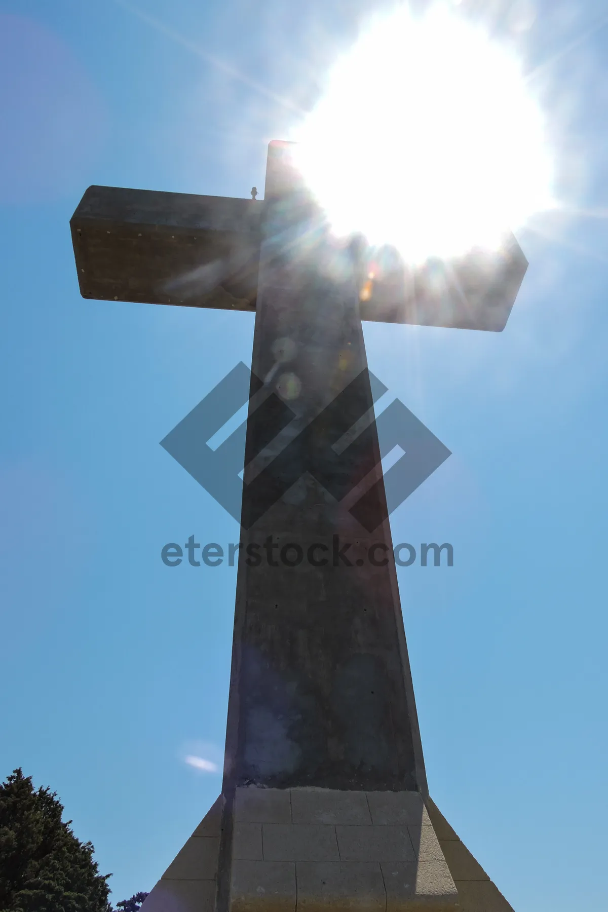 Picture of Cross-shaped turbine monument against sky background