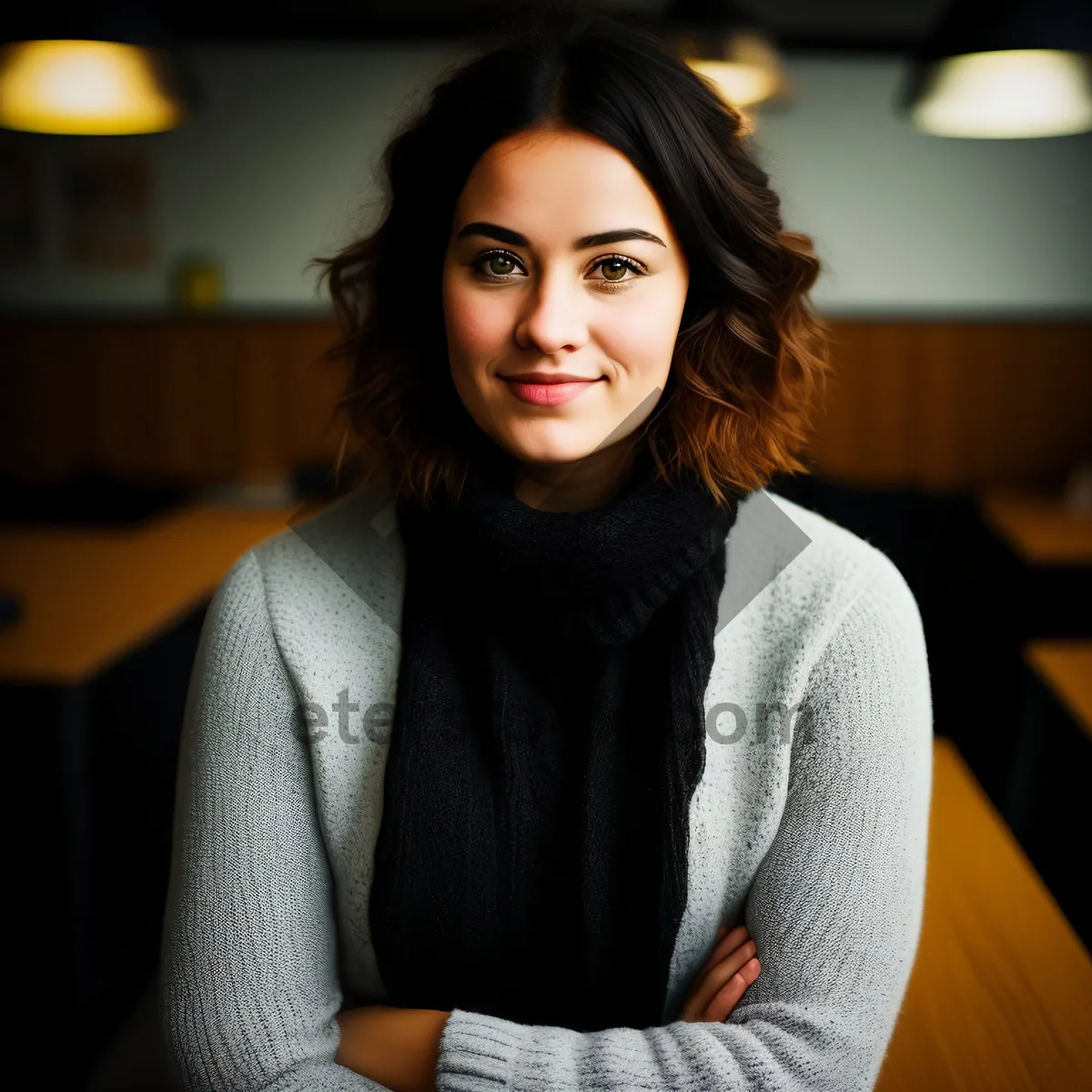 Picture of Smiling brunette businesswoman in fashionable sweater portrait.