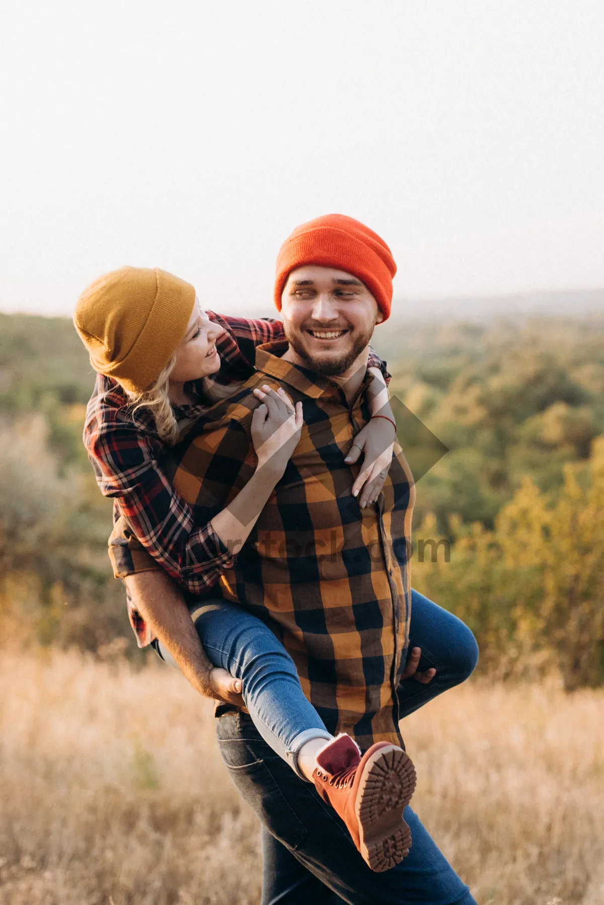 Picture of Happy man playing sports in summer field.