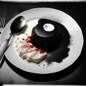 Delicious dessert on white plate with sauce