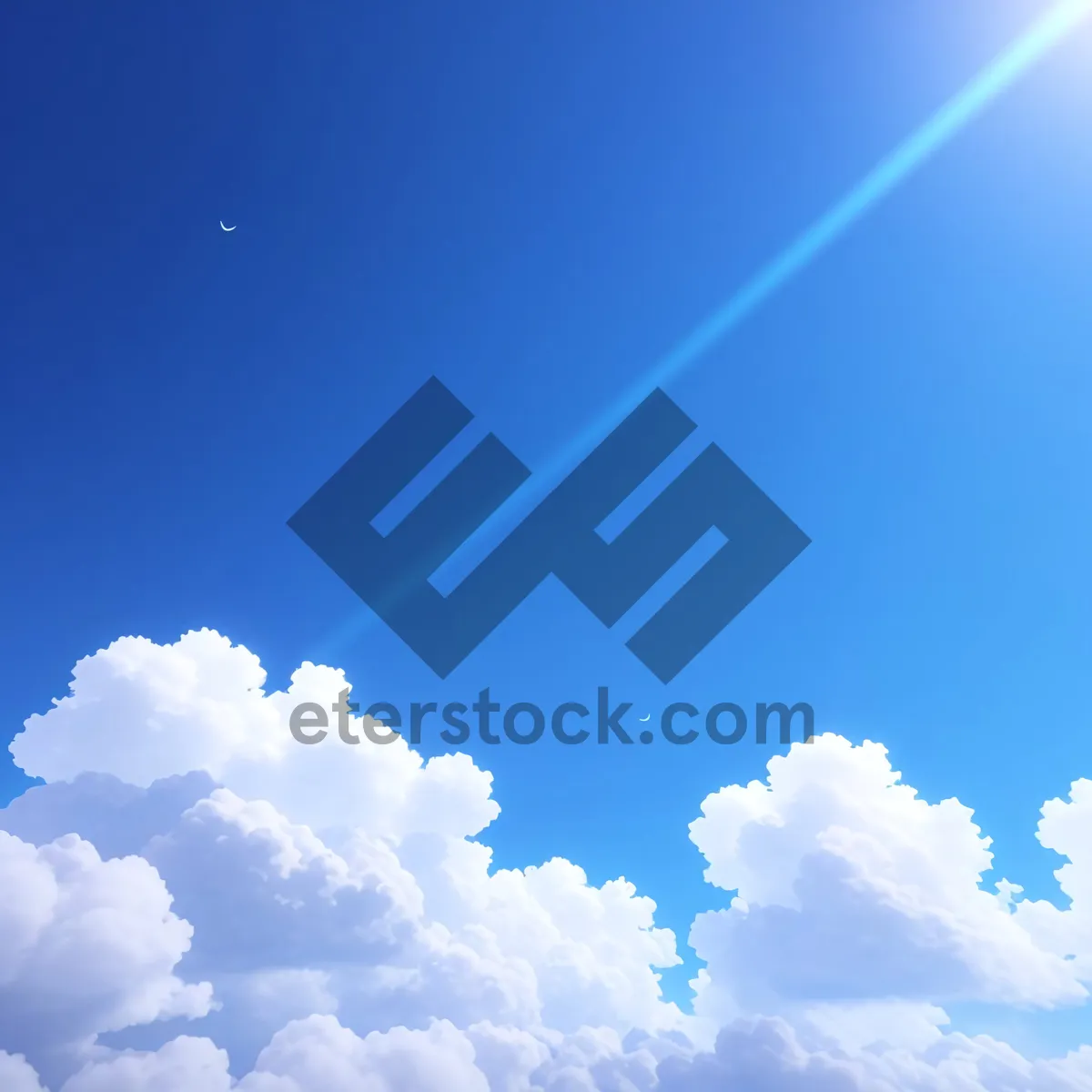 Picture of Sunlit Cloudscape Over Clear Blue Sky