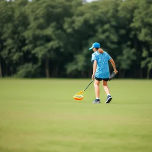 Professional golfer hitting drive on fairway.