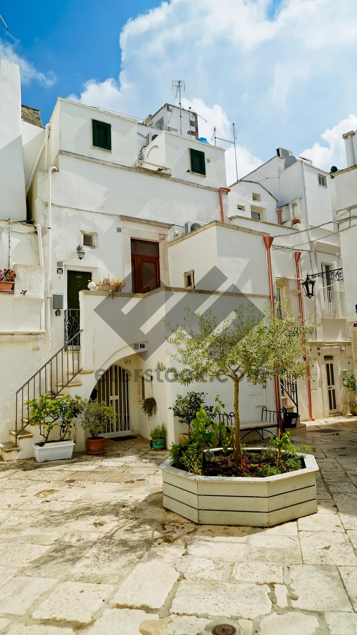 Picture of Old stone house with balcony and flowers