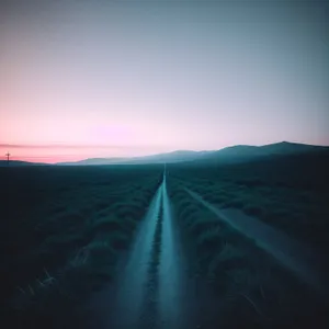 Sunset Road through Rural Desert Landscape