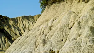 Rocky Canyon Skyline Landscape with Thatched Roof Hut