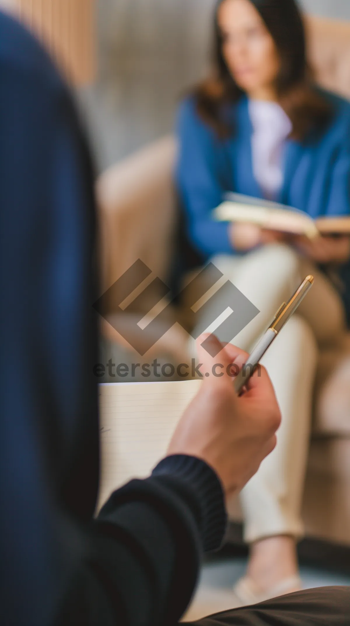 Picture of Professional secretary working in office holding pen and paper