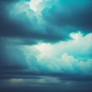 Summer Sky with Fluffy Clouds and Sunlight