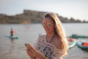 Stylish Brunette Fashion Model Smiling Happily At Camera