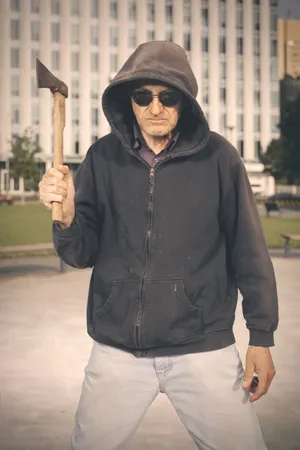 Black adult man wearing ski mask portrait.