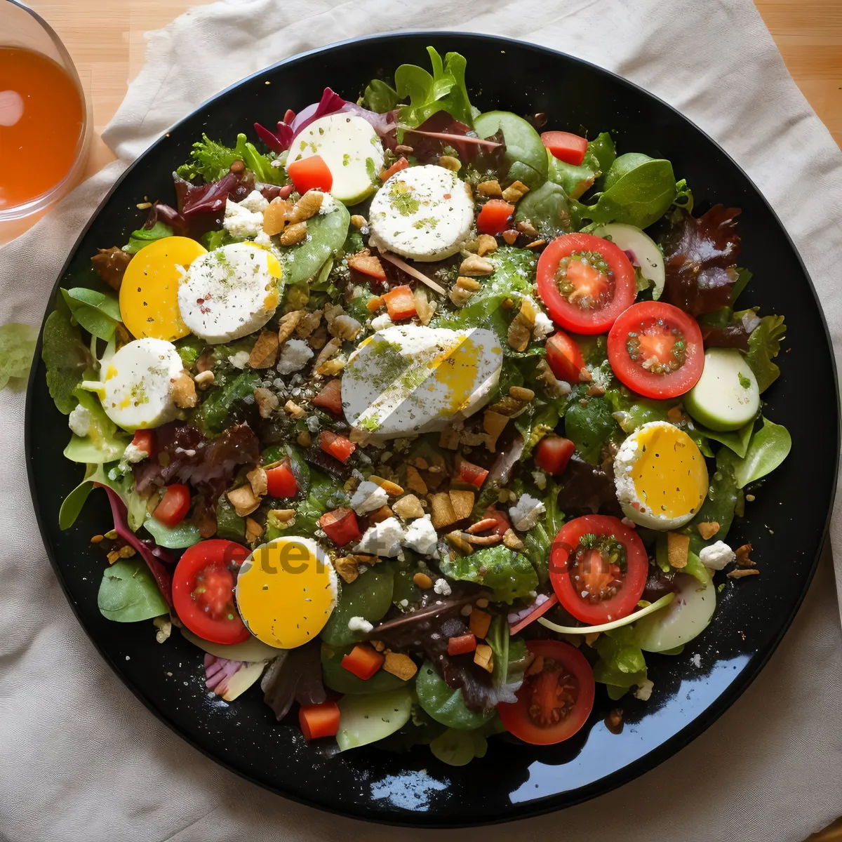 Picture of Fresh vegetable salad with gourmet cheese and tomato sauce