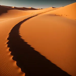 Serenity in the Sahara: A Majestic Sunset over Morocco's Golden Dunes