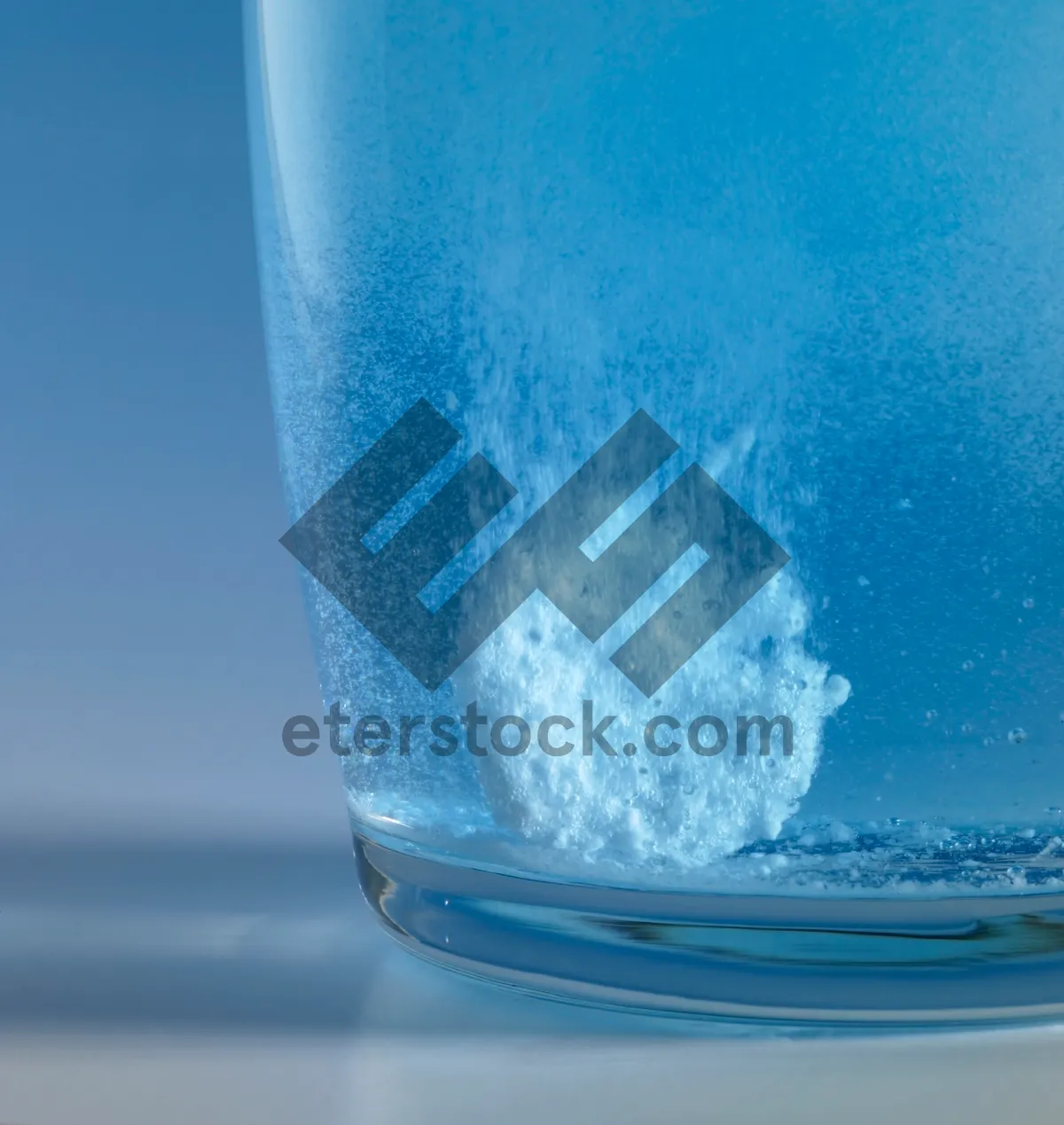 Picture of Refreshing Water Splash in Clear Glass Container