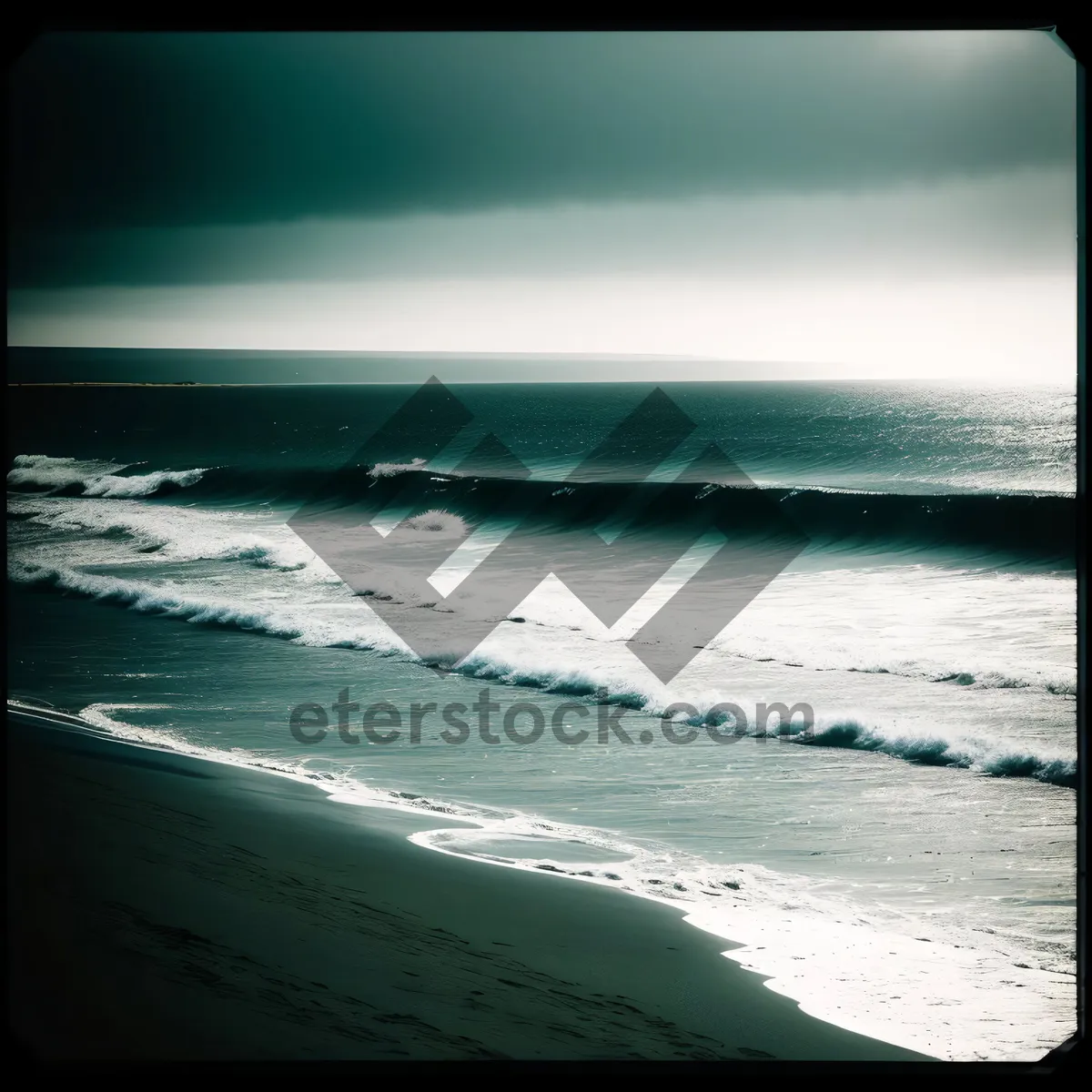 Picture of Serene Beachscape: Sunny Waves Caressing Sandy Coast