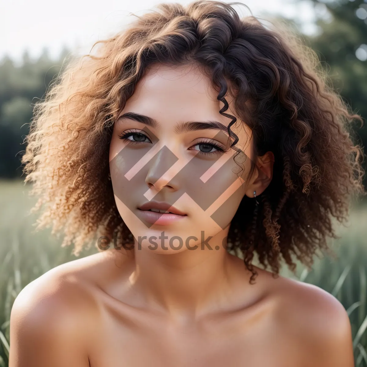 Picture of Stunning Curly-Haired Model Poses With Confidence