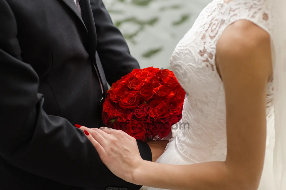 Picture of Wedding bouquet held in bride's hands