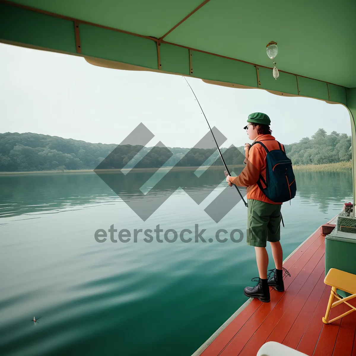 Picture of Serenity at Sea: Fisherman Reeling in the Catch