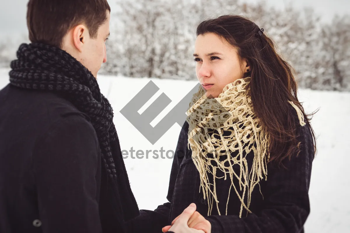 Picture of Attractive brunette lady smiling in fashionable coat