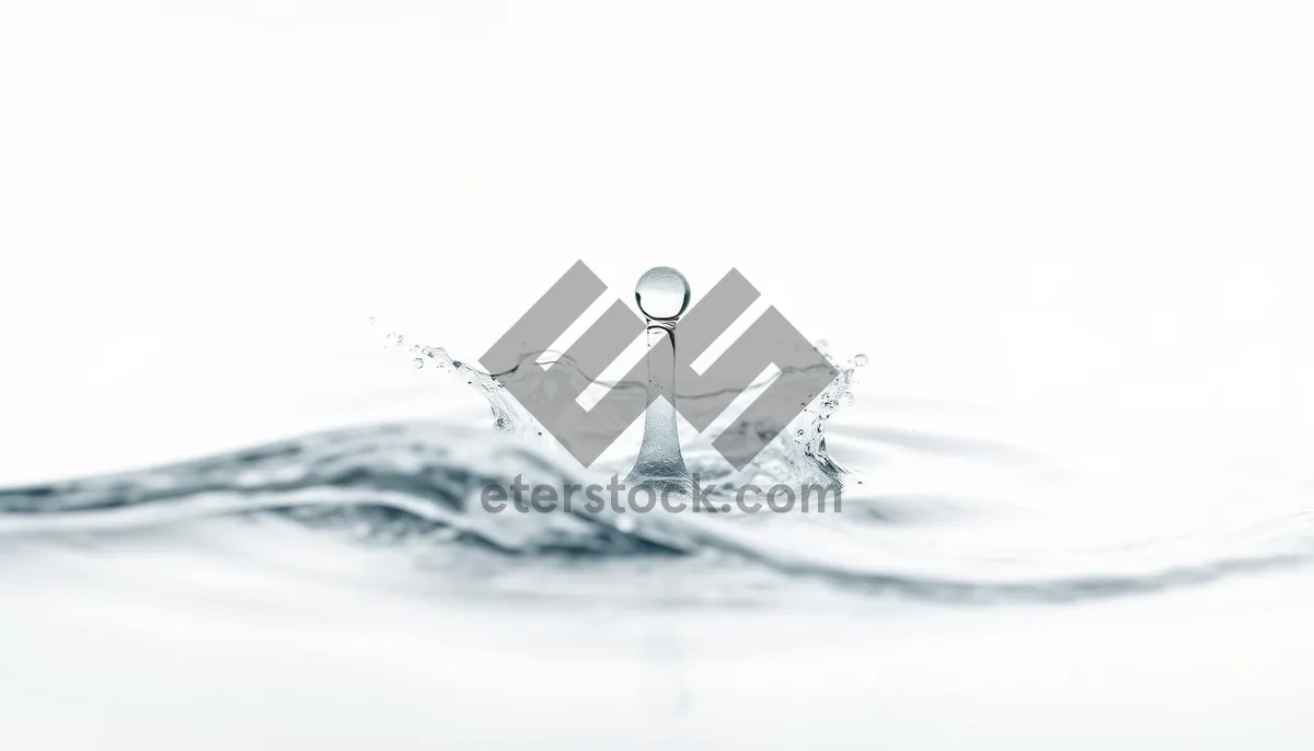 Picture of Refreshing Water Splash in Clear Blue Spa Environment