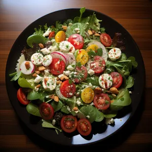 Fresh Gourmet Salad with Cheese, Tomatoes, and Olives.