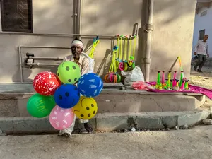 Festive seller with holiday decorations and piggy bank