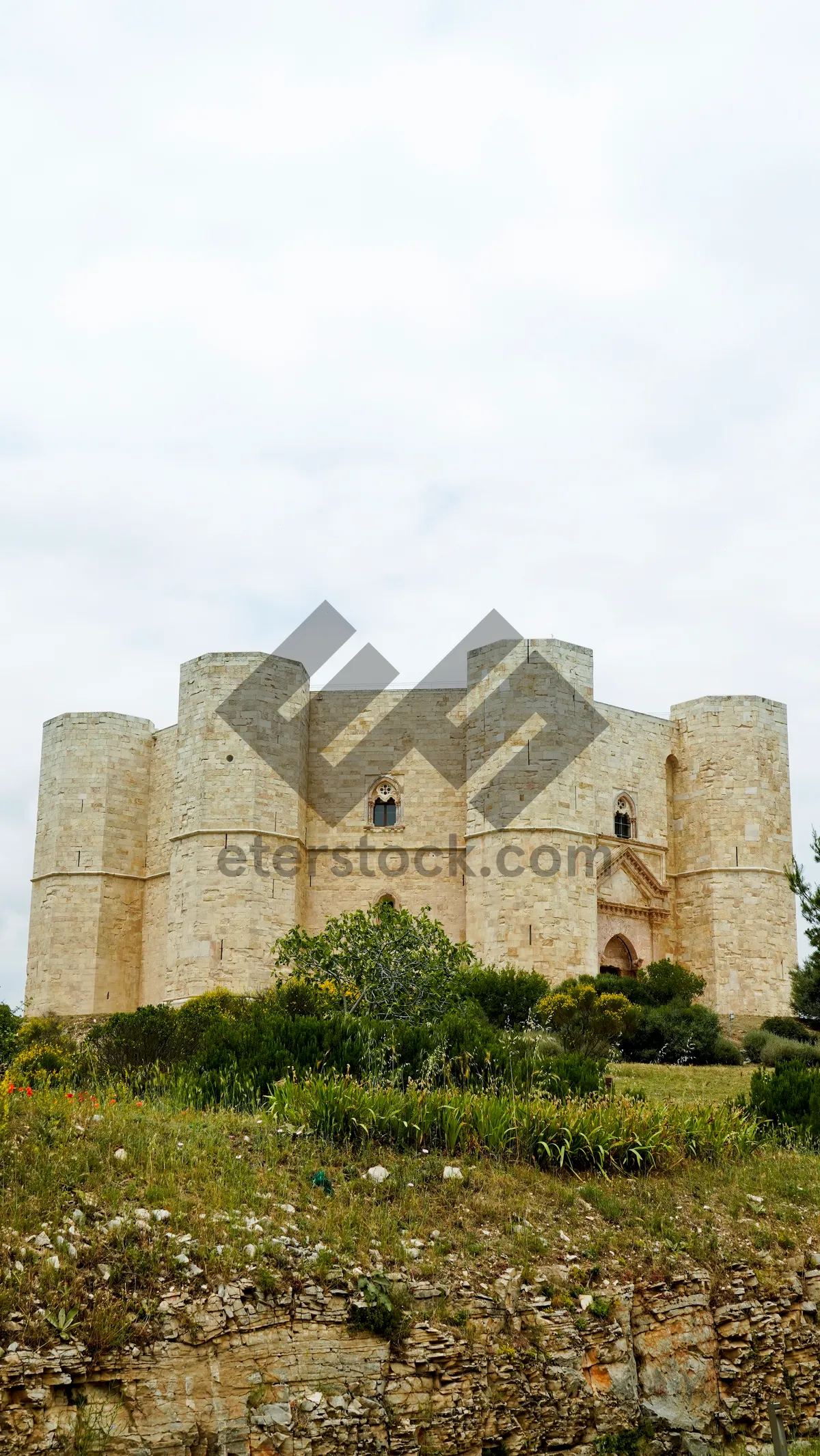 Picture of Ancient castle fortress against backdrop of clear blue sky