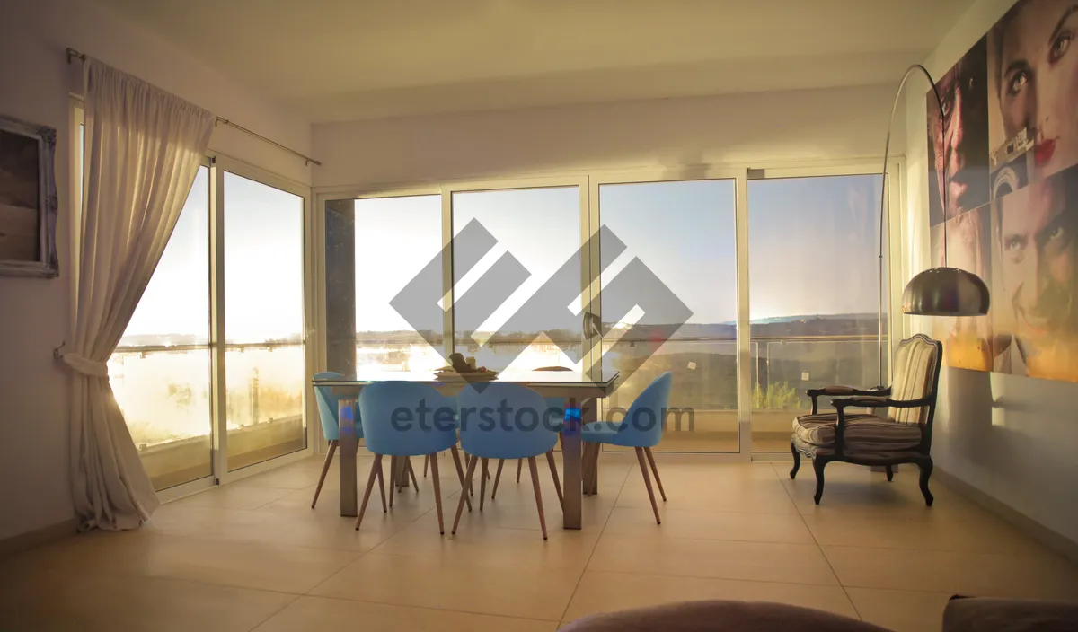 Picture of Modern luxury dining room with wooden furniture and view.