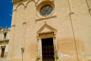 Medieval church entrance with stone arch