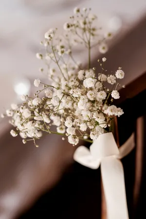 Spring bridal bouquet with cherry blossoms and spirea branches.