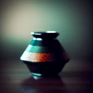 Ceramic Tea Cup with Hot Liquid in Vessel