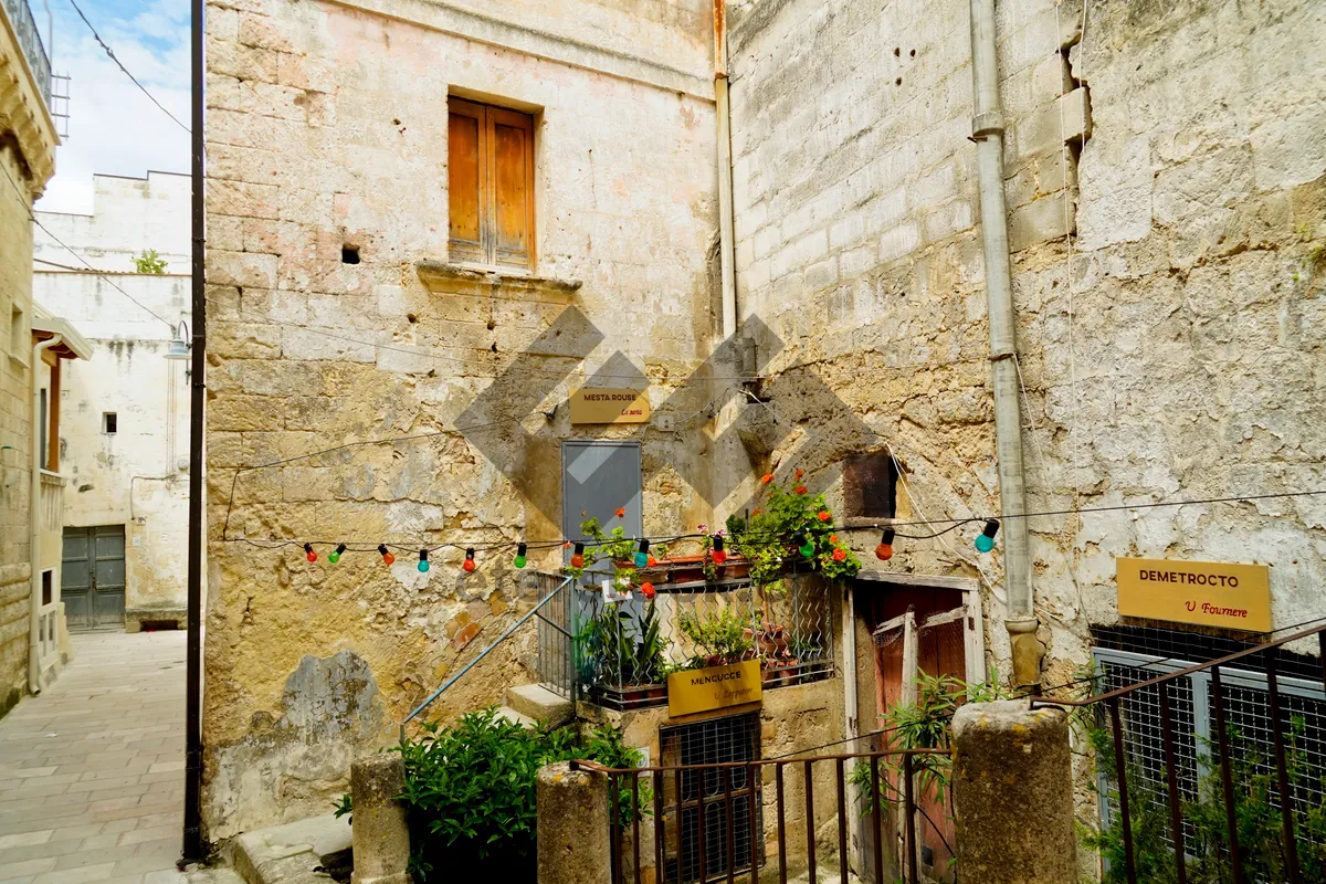 Picture of Medieval town street with old stone buildings.