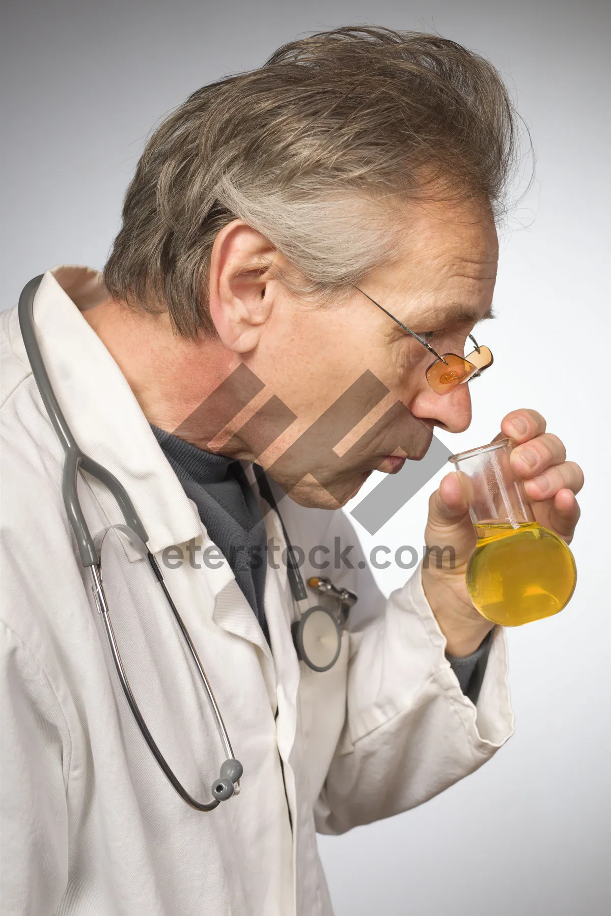 Picture of Smiling doctor in lab coat with stethoscope.